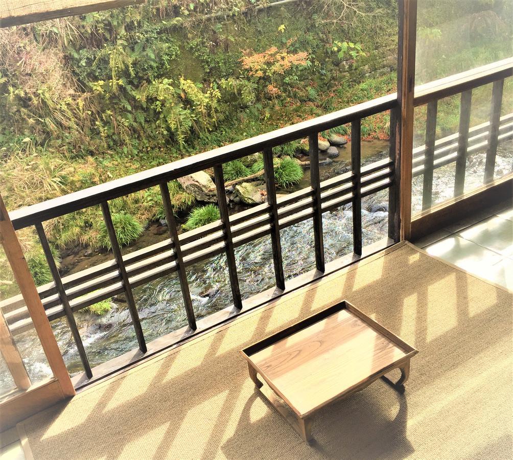 Onsen Guesthouse Tojiya Minamata Quarto foto